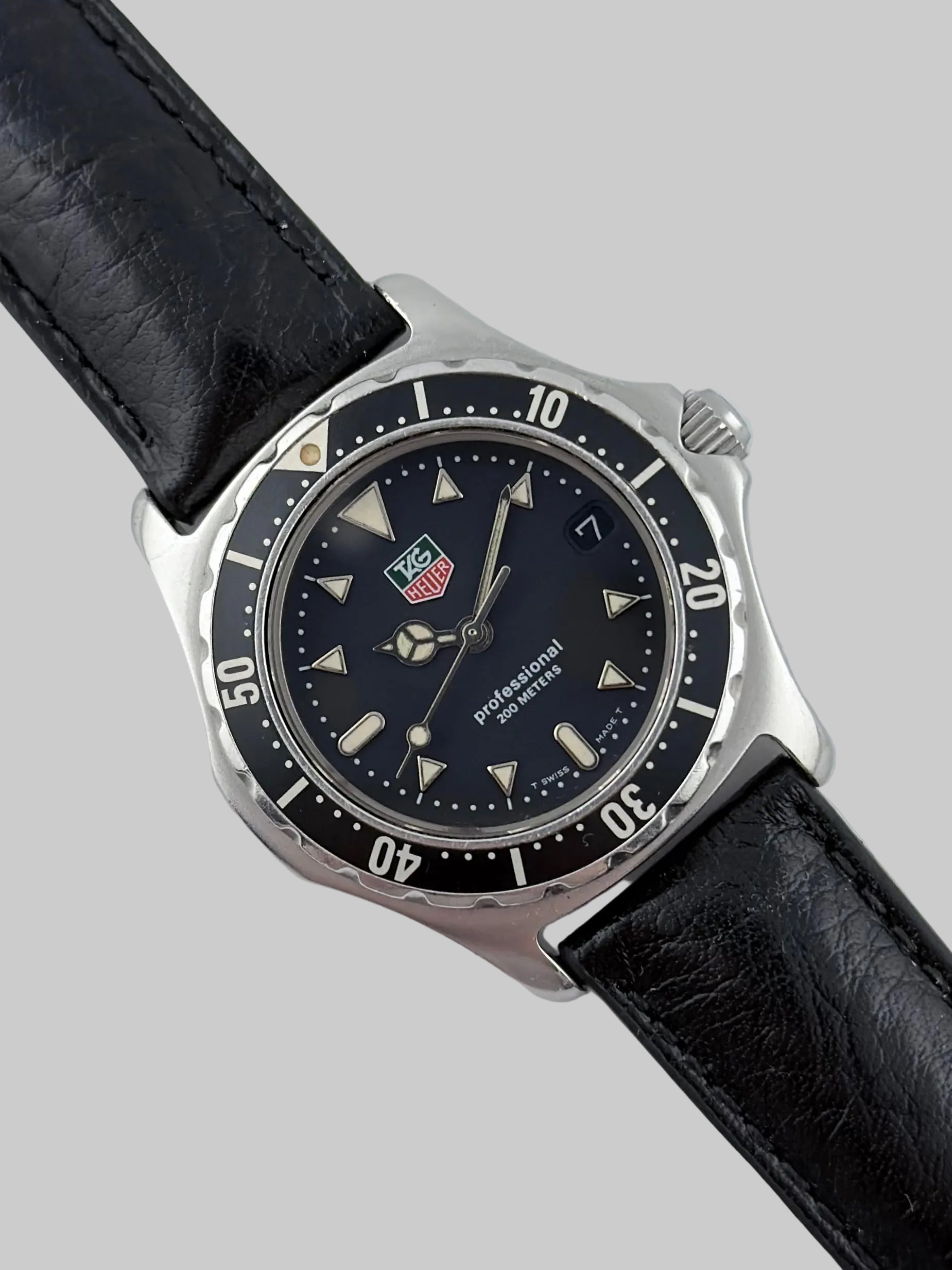 Tag Heuer Professional 200m Quartz Date - WE1214-R-2 – The Wrist