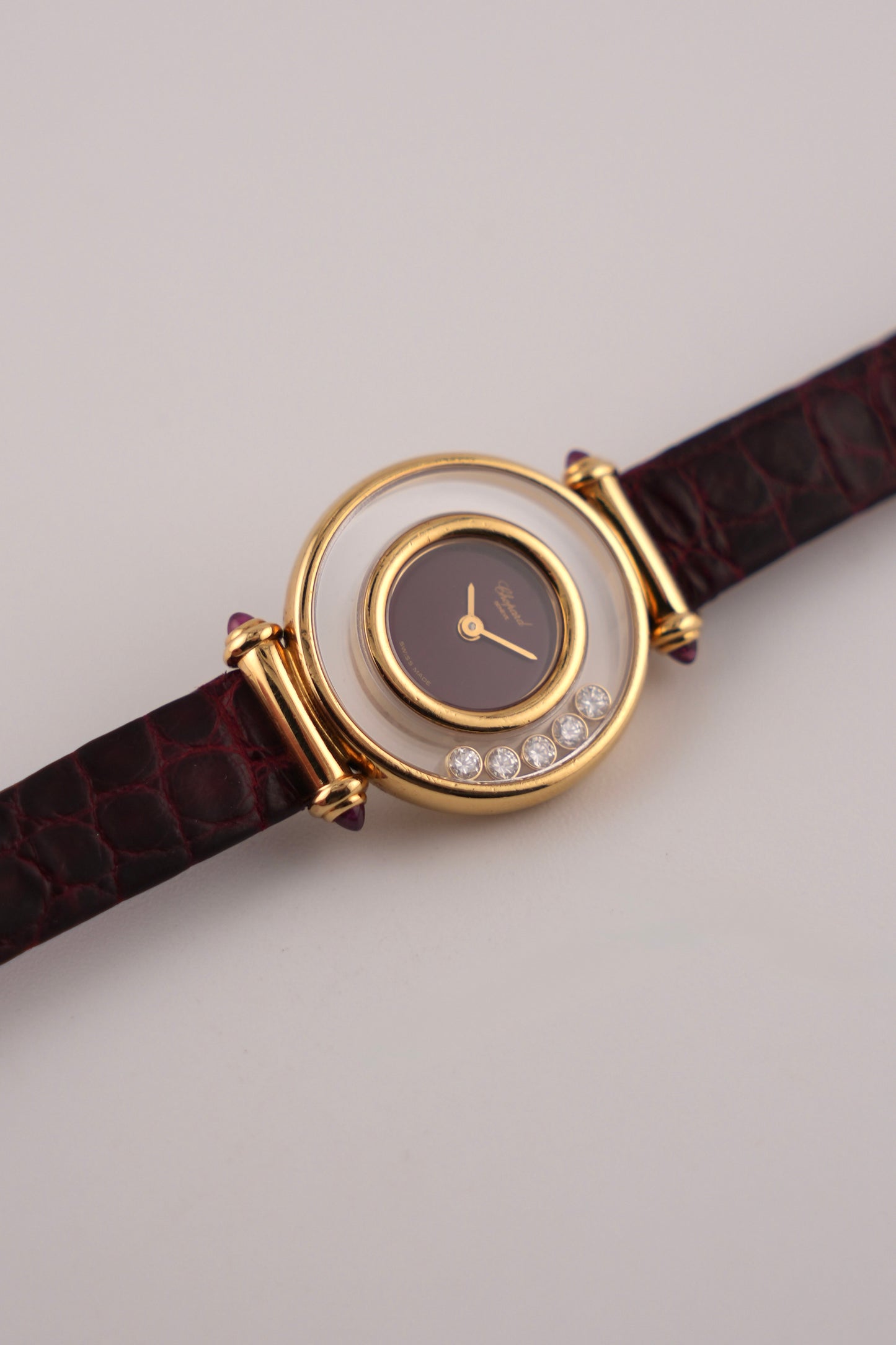 Chopard Happy Diamonds Ladies 18ct Gold Quartz - Burgundy Dial