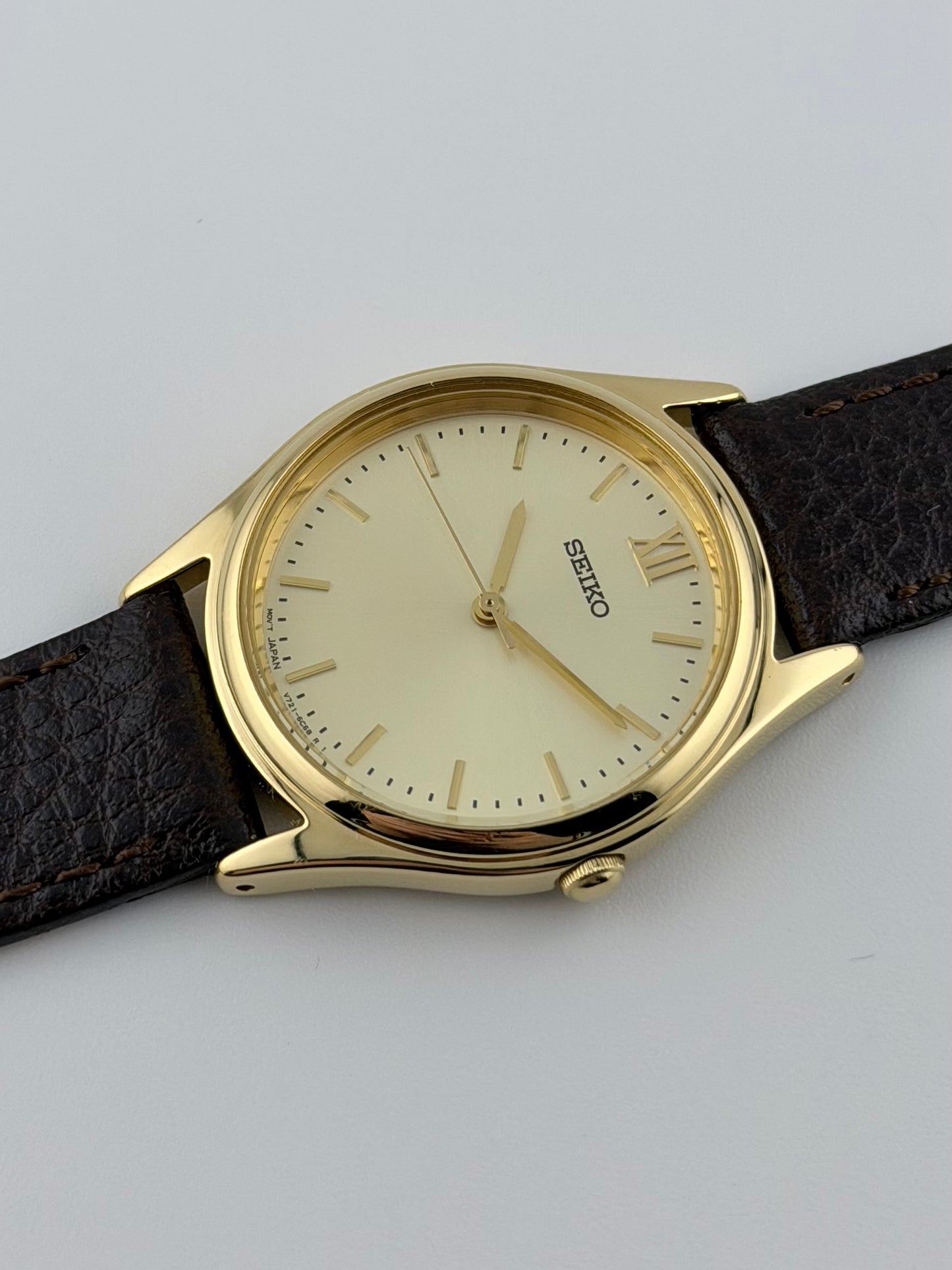 Seiko Quartz Dress Watch V721-6B10 - Sunburst Dial