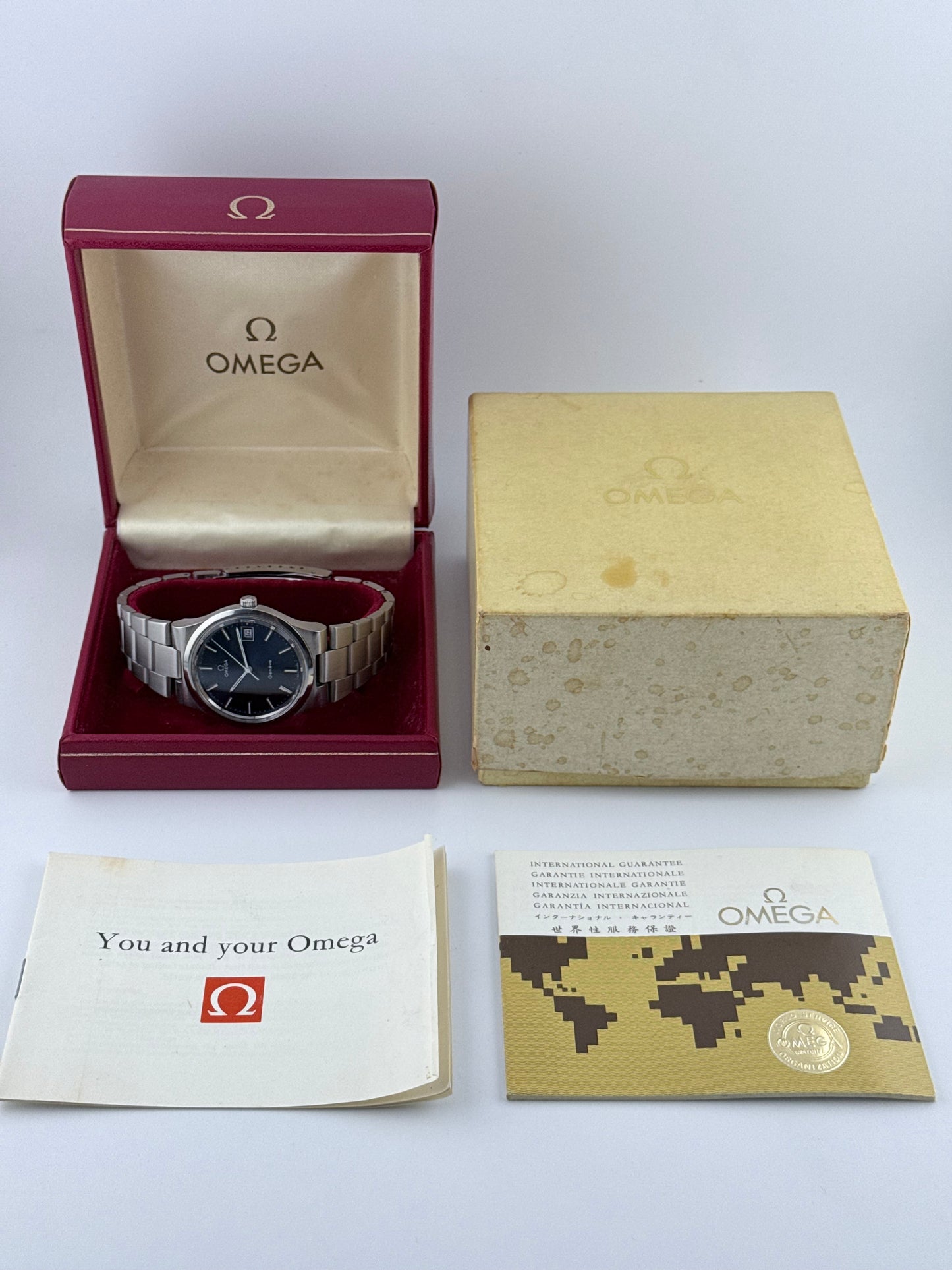 Omega Geneve Date Manual - 136.0103 - Rare Blue Dial - Box and Papers