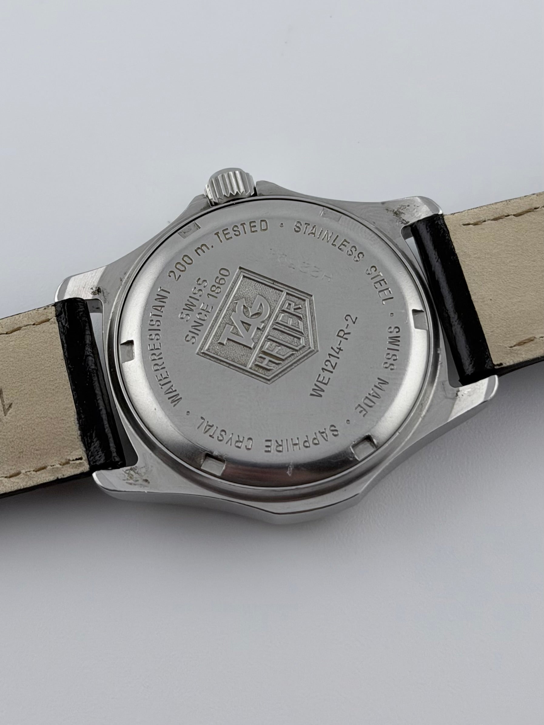 Tag Heuer Professional 200m Quartz Date - WE1214-R-2 – The Wrist