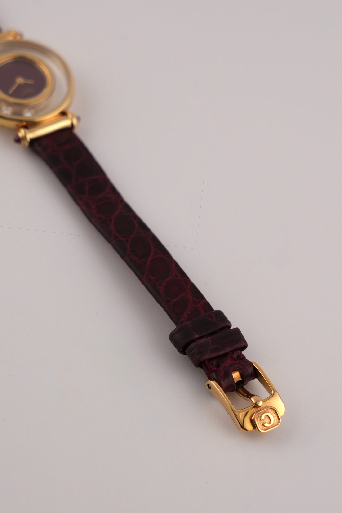 Chopard Happy Diamonds Ladies 18ct Gold Quartz - Burgundy Dial