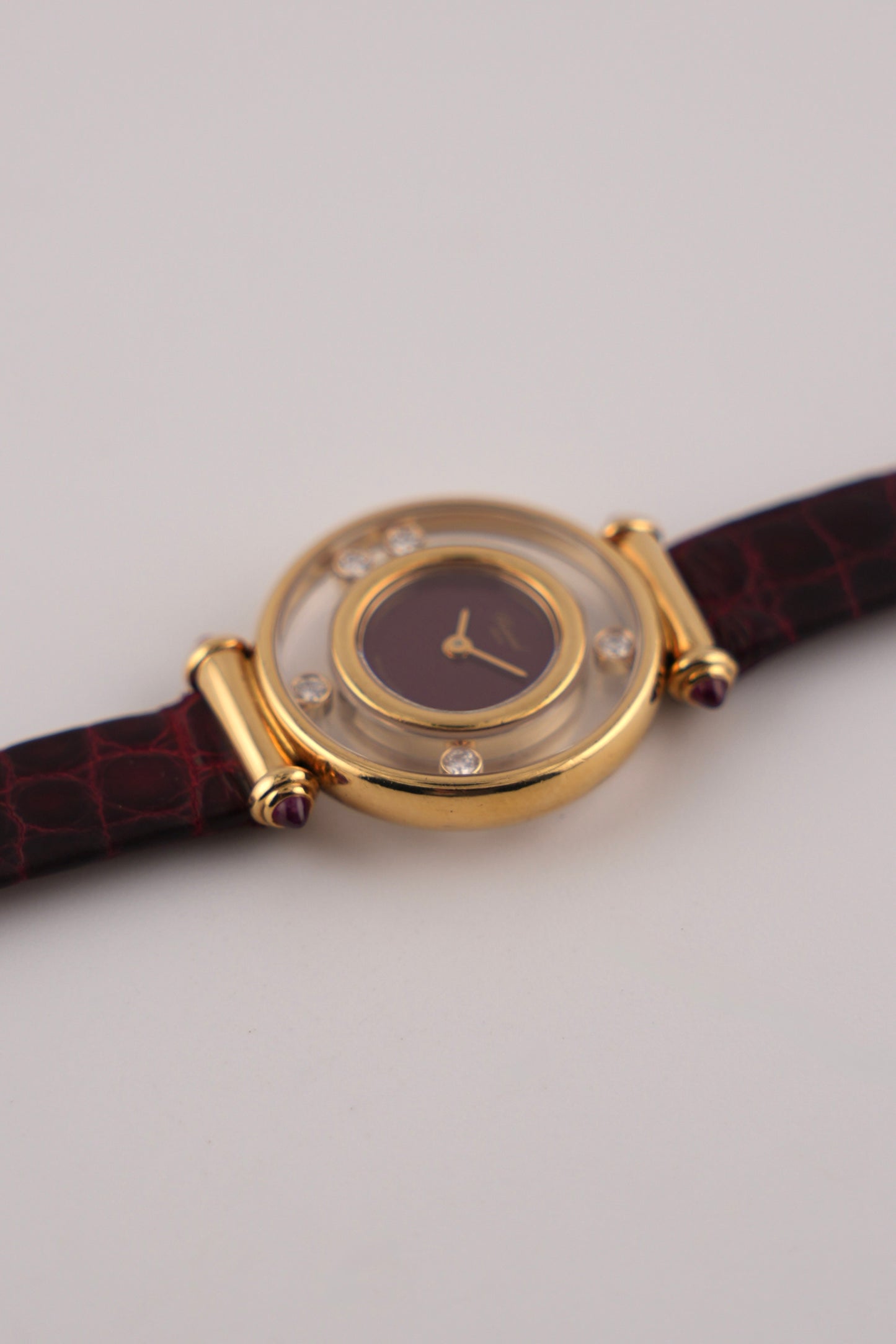 Chopard Happy Diamonds Ladies 18ct Gold Quartz - Burgundy Dial