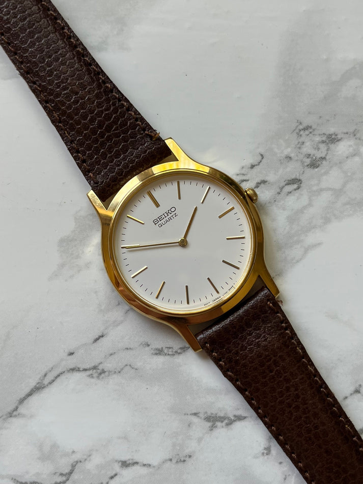 Montre Seiko V700-6091 Vintage - Cadran Blanc Pourtour Doré - Quartz - Années 80 - Occasion